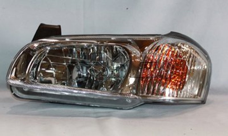 TYC 20-5770-00 Headlight Assembly - Left