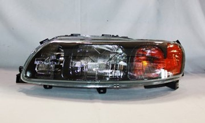 TYC 20-6558-00 Headlight Assembly - Left