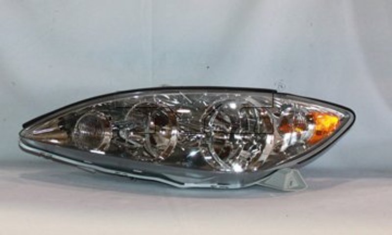 TYC 20-6576-00 Headlight Assembly - Left